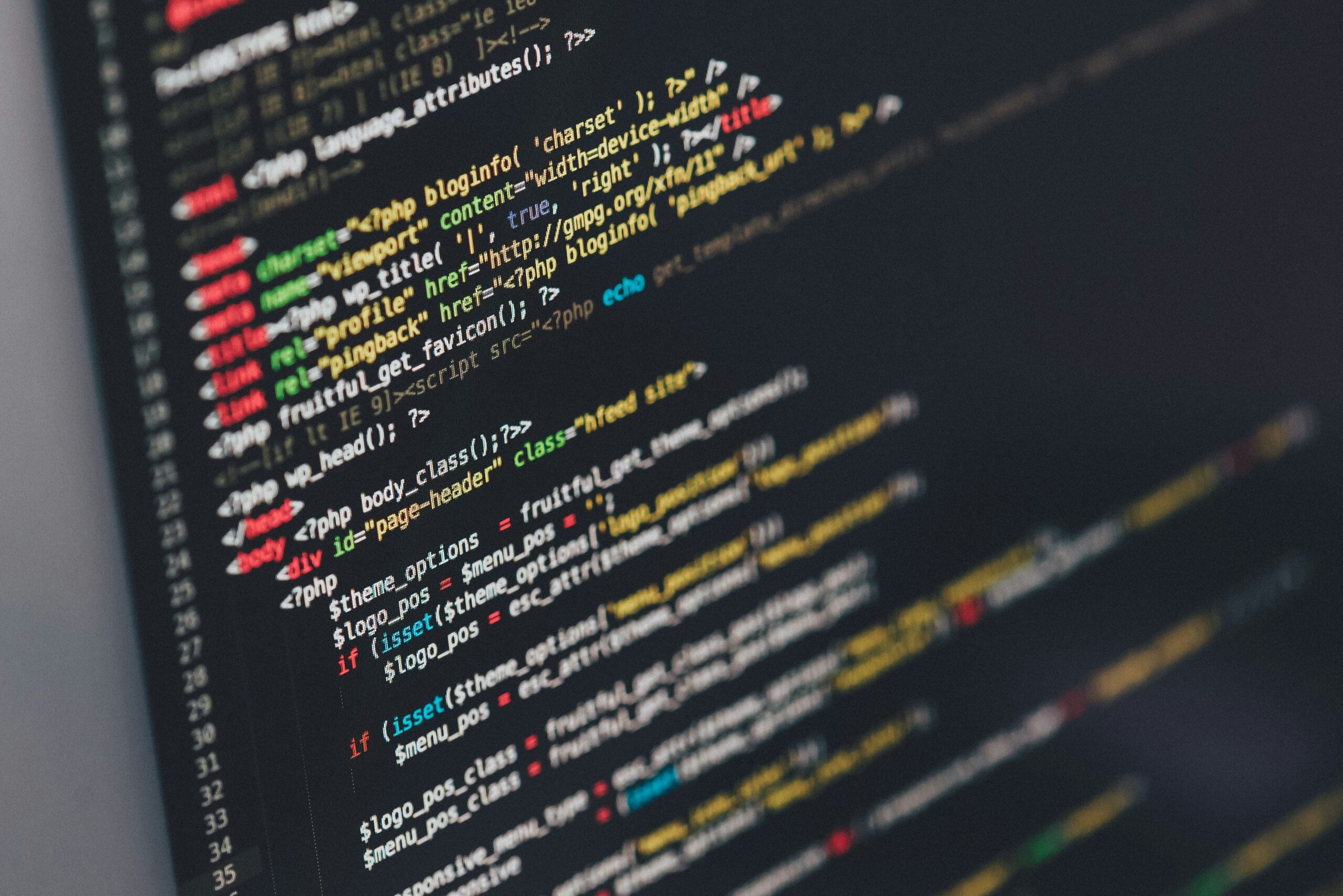 Laptop showing website coding and programming